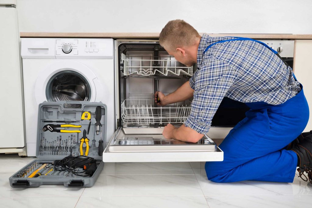 technician fixing a dishwasher repair trenton